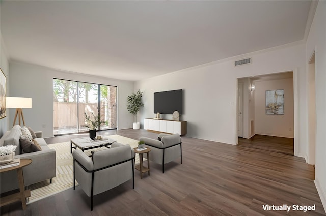 2400 N Braeswood Blvd Unit 106, Houston, TX 77030 - living area featuring wood finished floors and baseboards