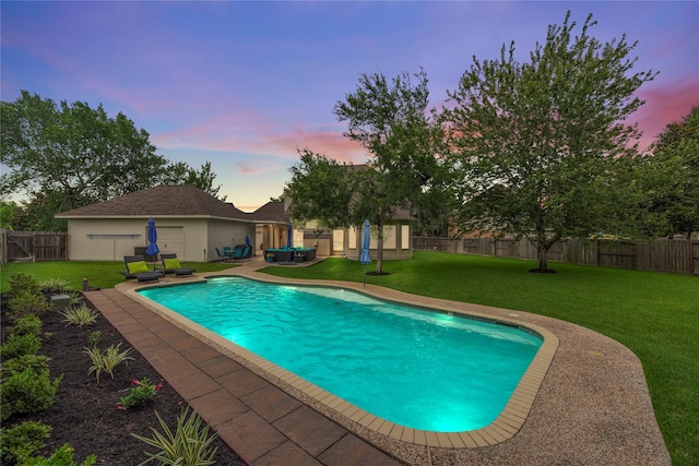3707 Doyle Ct, Missouri City, TX 77459 - pool at dusk with an outdoor hangout area and a patio area