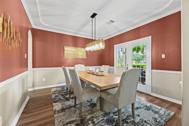 3707 Doyle Ct, Missouri City, TX 77459 - dining space with wood finished floors, ornamental molding, baseboards, arched walkways, and french doors