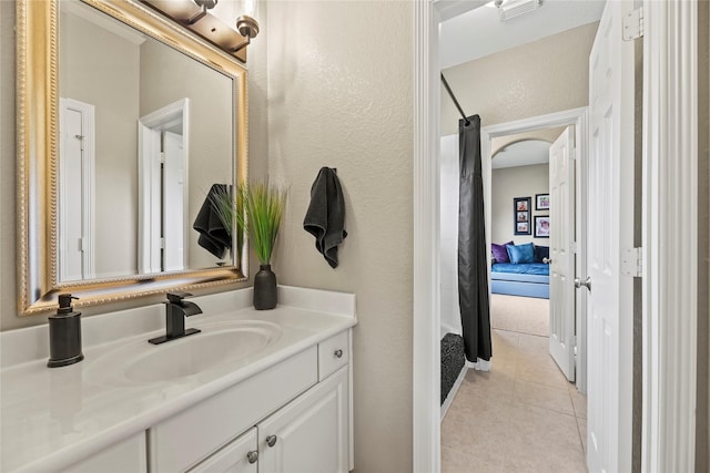 3707 Doyle Ct, Missouri City, TX 77459 - full bathroom featuring vanity, tile patterned flooring, a shower with shower curtain, and a textured wall