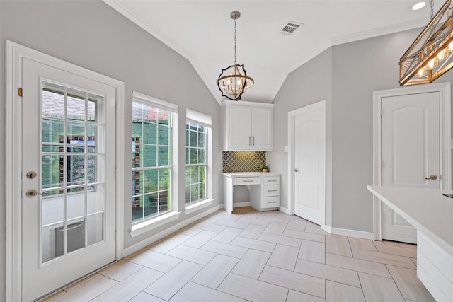 408 Pine Creek Dr, Friendswood, TX 77546 - unfurnished dining area featuring a chandelier, lofted ceiling, baseboards, and ornamental molding