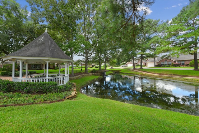 408 Pine Creek Dr, Friendswood, TX 77546 - view of home's community featuring a gazebo, a water view, and a yard