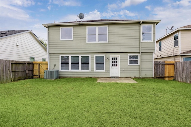 29422 Legends Line Dr, Spring, TX 77386 - back of property with a patio area and central AC