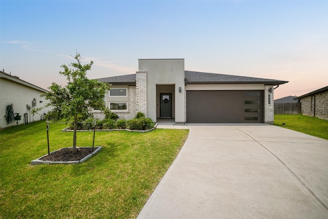 29419 Georgia Throw Ln, Katy, TX 77494 - contemporary house featuring driveway, an attached garage, and brick siding
