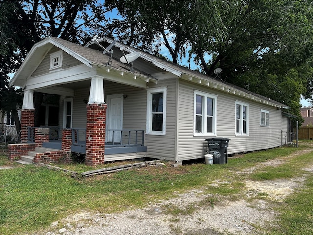 6015 Brady St, Houston, TX 77011 - view of side of home with covered porch