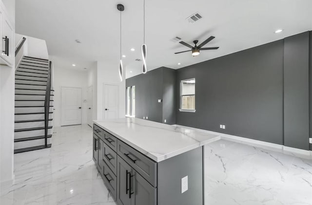 6732 Goforth, Houston, TX 77021 - kitchen featuring a ceiling fan, gray cabinets, light marble finish flooring, open floor plan, and recessed lighting