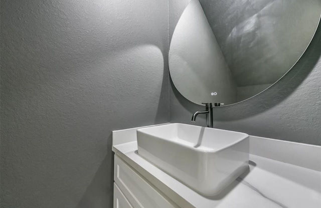 6732 Goforth, Houston, TX 77021 - bathroom featuring a textured wall and vanity