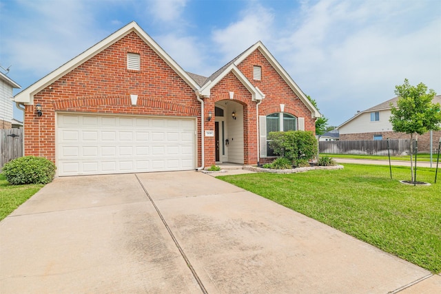 2630 Sable Ridge Ln, Katy, TX 77494 - traditional home with brick siding, driveway, and a garage