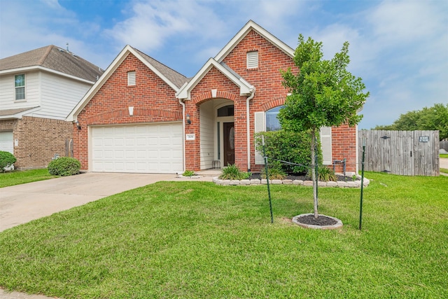 2630 Sable Ridge Ln, Katy, TX 77494 - traditional home featuring brick siding, driveway, and a garage
