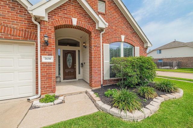 2630 Sable Ridge Ln, Katy, TX 77494 - entrance to property with brick siding and a garage