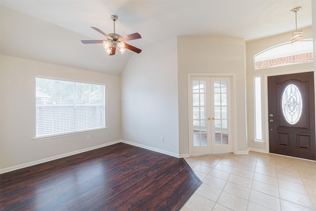 2630 Sable Ridge Ln, Katy, TX 77494 - tiled entrance foyer featuring plenty of natural light, vaulted ceiling, ceiling fan, and baseboards