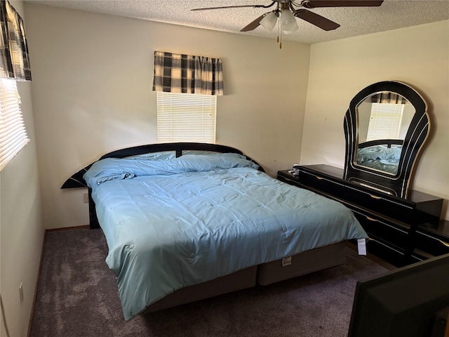 7719 County Road 233, Centerville, TX 75833 - bedroom with carpet flooring, a textured ceiling, and a ceiling fan