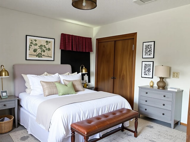 7719 County Road 233, Centerville, TX 75833 - bedroom featuring a closet and light carpet