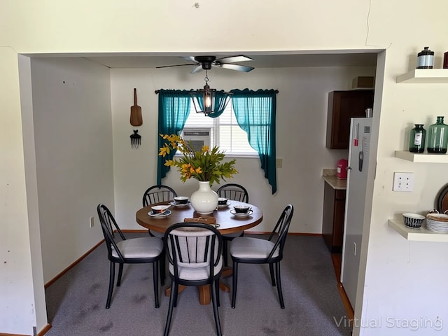 7719 County Road 233, Centerville, TX 75833 - dining room featuring a ceiling fan, dark carpet, baseboards, and cooling unit