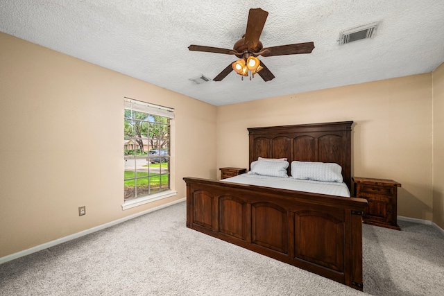 8023 Litchfield Ln, Spring, TX 77379 - bedroom with carpet floors, baseboards, a textured ceiling, and ceiling fan