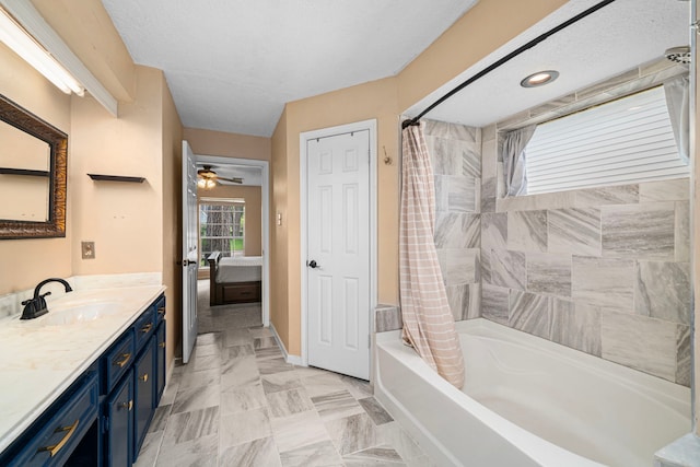 8023 Litchfield Ln, Spring, TX 77379 - full bathroom with shower / bath combo with shower curtain, vanity, connected bathroom, and a ceiling fan