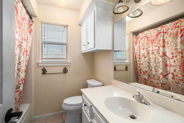 8023 Litchfield Ln, Spring, TX 77379 - full bath featuring vanity, tile patterned flooring, toilet, a textured ceiling, and shower / tub combo with curtain