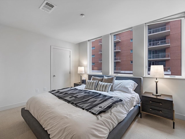 2520 Robinhood St Unit 1012, Houston, TX 77005 - bedroom with carpet flooring and baseboards