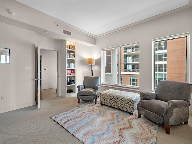 2520 Robinhood St Unit 1012, Houston, TX 77005 - living area with carpet, ornamental molding, and baseboards