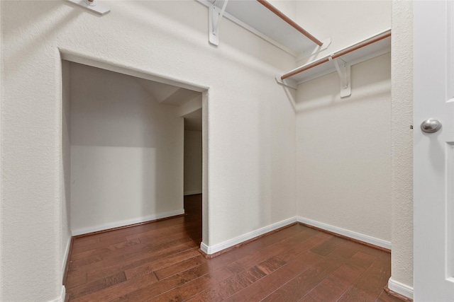 7427 Pony Crk, Missouri City, TX 77459 - spacious closet with dark wood-style floors