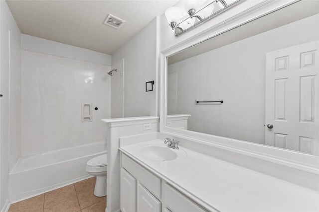 7427 Pony Crk, Missouri City, TX 77459 - bathroom featuring toilet, vanity, shower / bathtub combination, and tile patterned floors