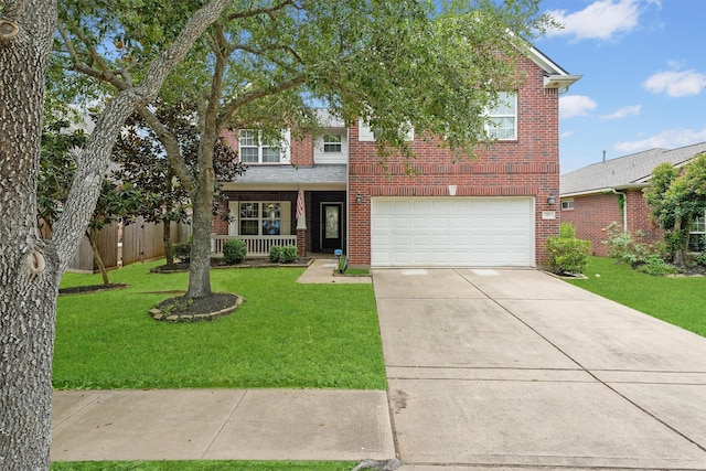 7427 Pony Crk, Missouri City, TX 77459 - view of front of house with concrete driveway, brick siding, an attached garage, and a porch