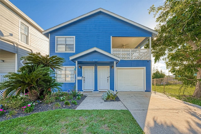 1717 22nd St, Galveston, TX 77550 - view of front facade with an attached garage and driveway