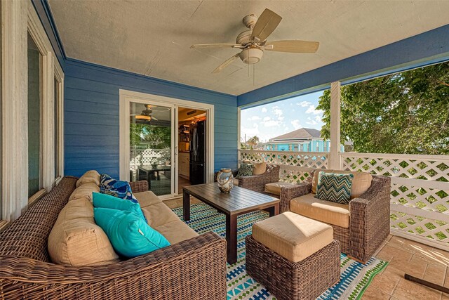 1717 22nd St, Galveston, TX 77550 - sunroom / solarium with a ceiling fan and an outdoor hangout area