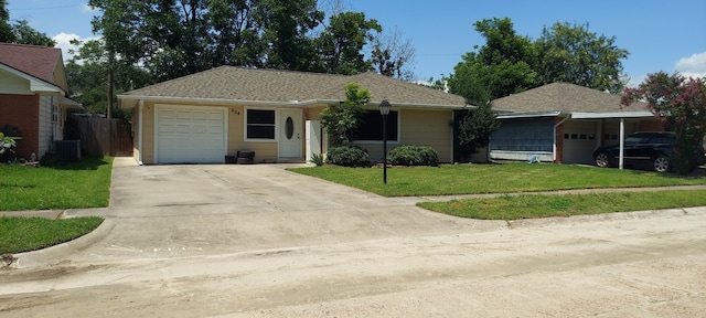 234 Maxie St, Deer Park, TX 77536 - ranch-style house featuring a garage, concrete driveway, a front lawn, and central AC