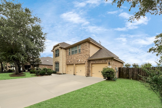 3922 Crestwind Ln, Richmond, TX 77407 - traditional-style home featuring brick siding, concrete driveway, a shingled roof, and a garage