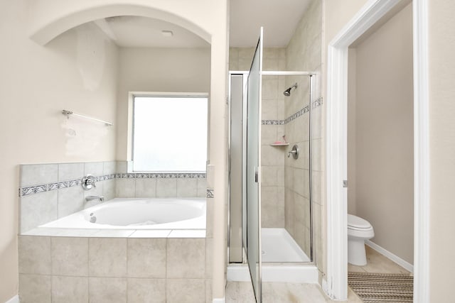 3922 Crestwind Ln, Richmond, TX 77407 - full bath with a garden tub, a stall shower, toilet, and tile patterned floors
