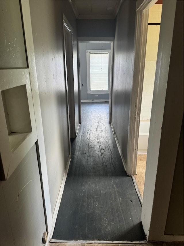 4204 Wipprecht St, Houston, TX 77026 - hall with wood-type flooring, crown molding, and baseboards