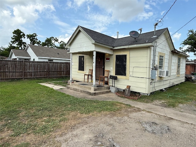 4204 Wipprecht St, Houston, TX 77026 - view of front of property featuring cooling unit and roof with shingles