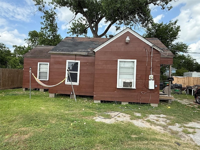 4204 Wipprecht St, Houston, TX 77026 - view of side of property with a shingled roof