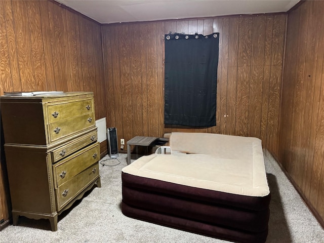 4204 Wipprecht St, Houston, TX 77026 - bedroom featuring carpet floors and wood walls