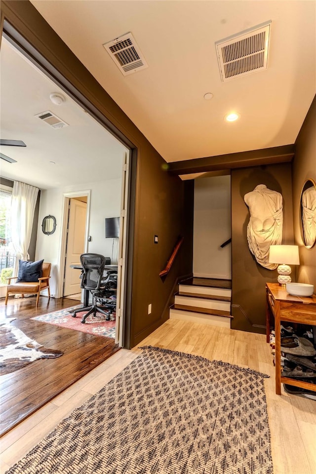 242 E 28th St, Houston, TX 77008 - hallway featuring light wood-style flooring, stairs, and an office area