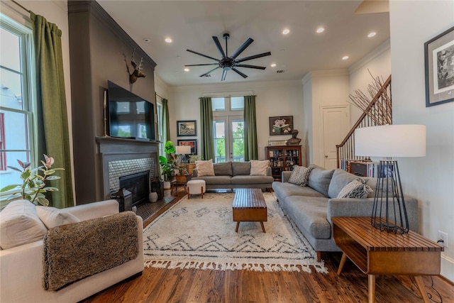 242 E 28th St, Houston, TX 77008 - living area with a glass covered fireplace, wood finished floors, ceiling fan, ornamental molding, and recessed lighting