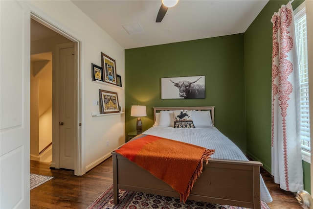 242 E 28th St, Houston, TX 77008 - bedroom with wood finished floors, ceiling fan, and baseboards