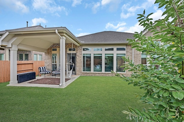 16819 Talisker Dr, Richmond, TX 77407 - rear view of property with brick siding, a patio, and a shingled roof