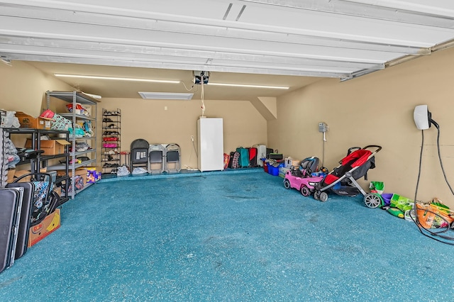 16819 Talisker Dr, Richmond, TX 77407 - garage featuring a garage door opener