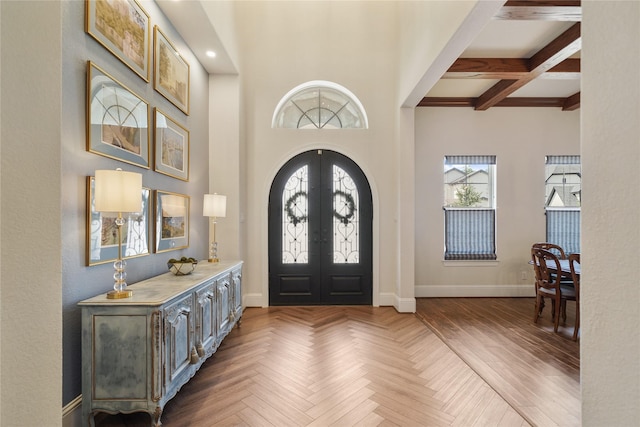 2314 Red Fox Dr, Missouri City, TX 77459 - entrance foyer with baseboards, french doors, beam ceiling, a high ceiling, and recessed lighting