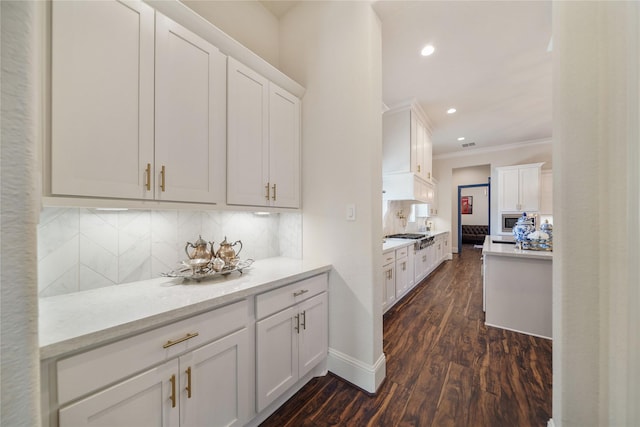 2314 Red Fox Dr, Missouri City, TX 77459 - bar with crown molding, dark wood-style flooring, decorative backsplash, recessed lighting, and baseboards
