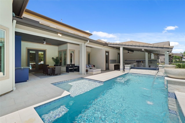 2314 Red Fox Dr, Missouri City, TX 77459 - swimming pool with an outdoor kitchen, french doors, ceiling fan, an outdoor hangout area, and a patio area