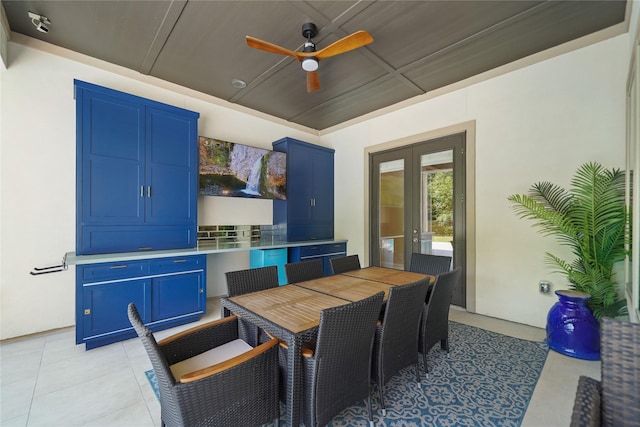 2314 Red Fox Dr, Missouri City, TX 77459 - dining room with french doors, ceiling fan, and light tile patterned floors