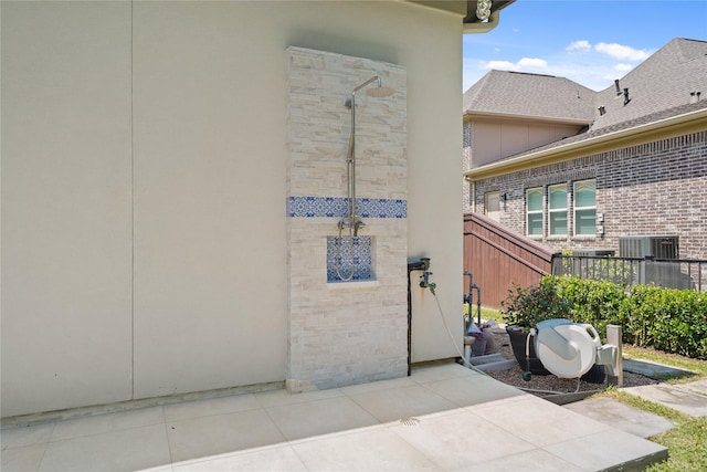 2314 Red Fox Dr, Missouri City, TX 77459 - property entrance with cooling unit and brick siding