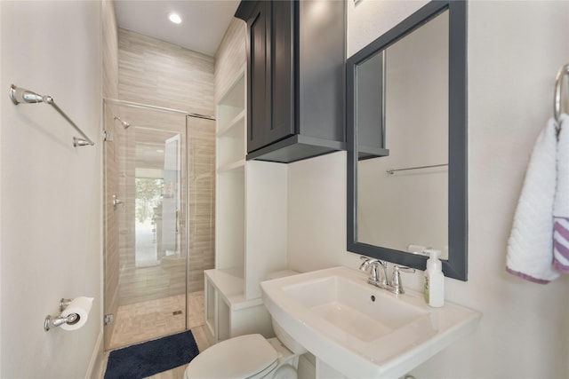 2314 Red Fox Dr, Missouri City, TX 77459 - full bathroom featuring a shower stall, toilet, a sink, and recessed lighting