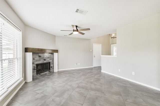2318 Old Oak Ln, Kingwood, TX 77339 - unfurnished living room with ceiling fan, a fireplace, baseboards, and a chandelier