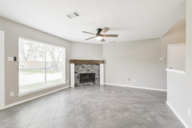 2318 Old Oak Ln, Kingwood, TX 77339 - unfurnished living room featuring ceiling fan, a fireplace, baseboards, and light tile patterned floors
