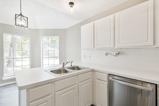 2318 Old Oak Ln, Kingwood, TX 77339 - kitchen with dishwasher, a peninsula, a sink, light countertops, and lofted ceiling