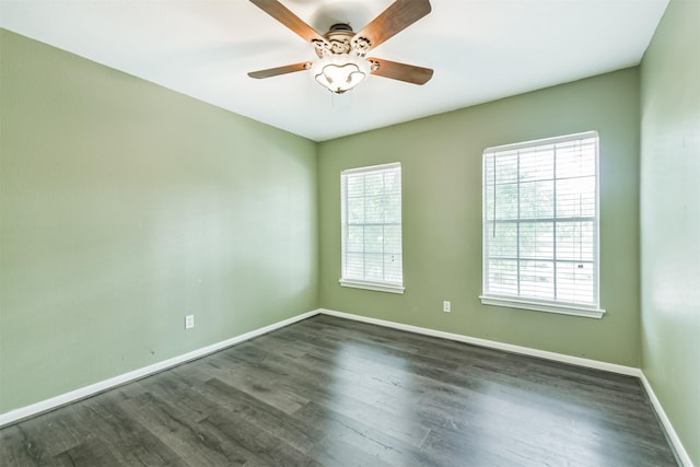 2318 Old Oak Ln, Kingwood, TX 77339 - spare room featuring baseboards, dark wood-style floors, and ceiling fan